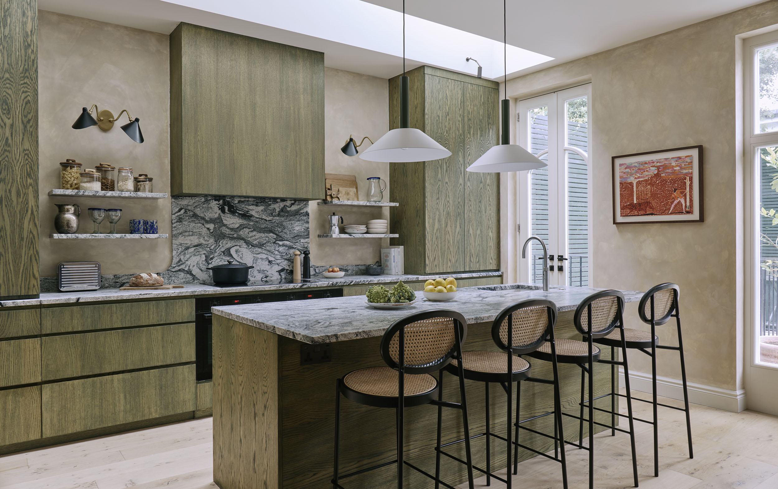 Image showing a green kitchen with marble counters, interior design by Studio Squire