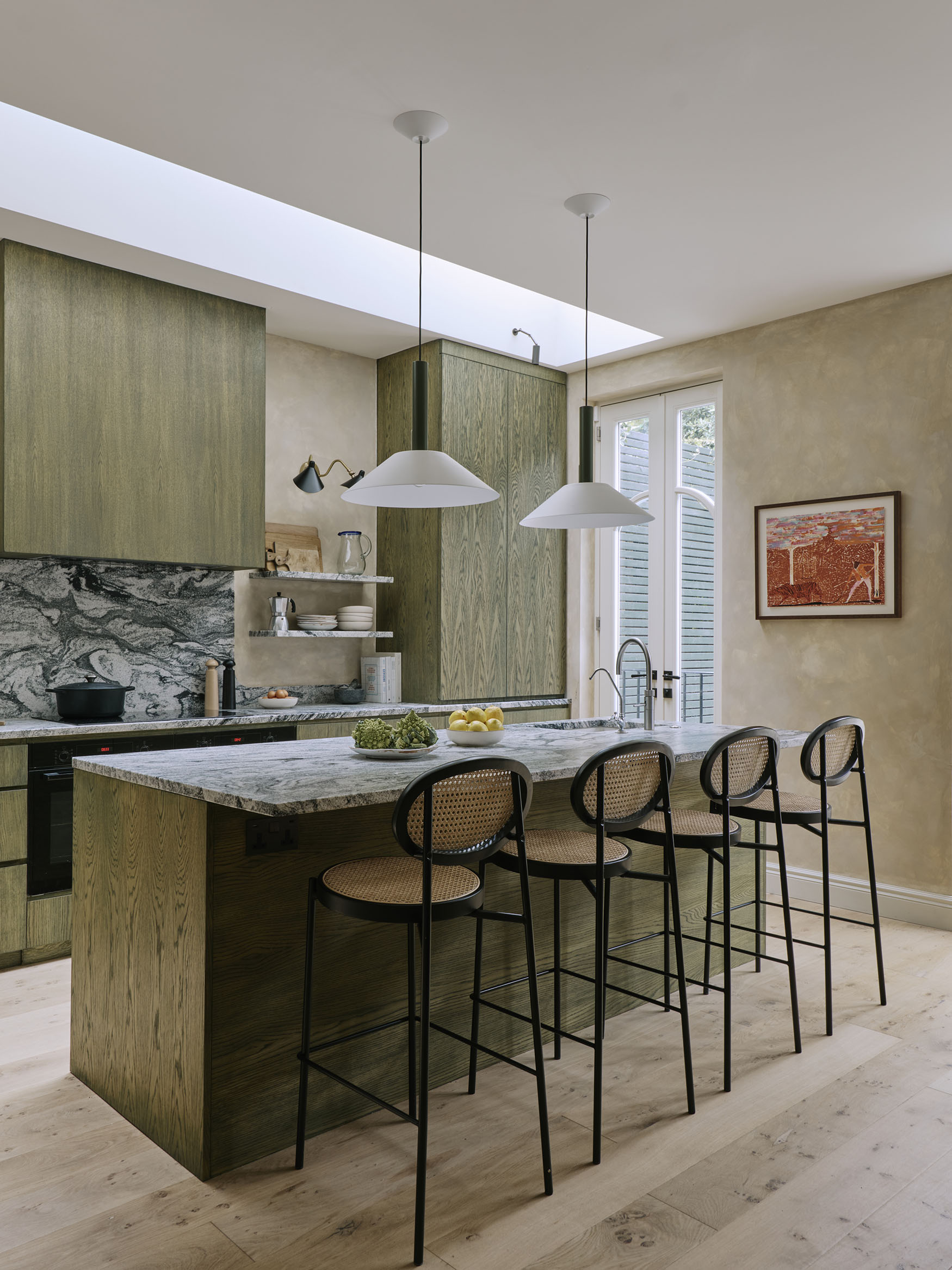 Image showing a green kitchen with marble counters, interior design by Studio Squire