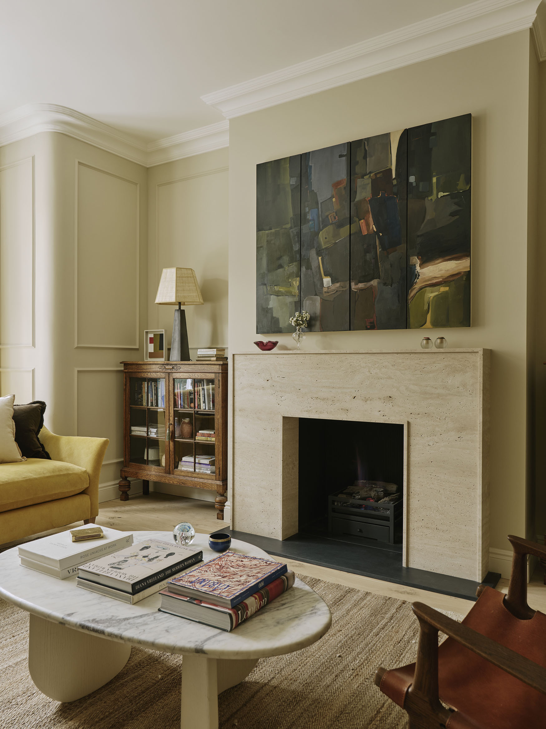 Painting above a fireplace, interior design by Studio Squire