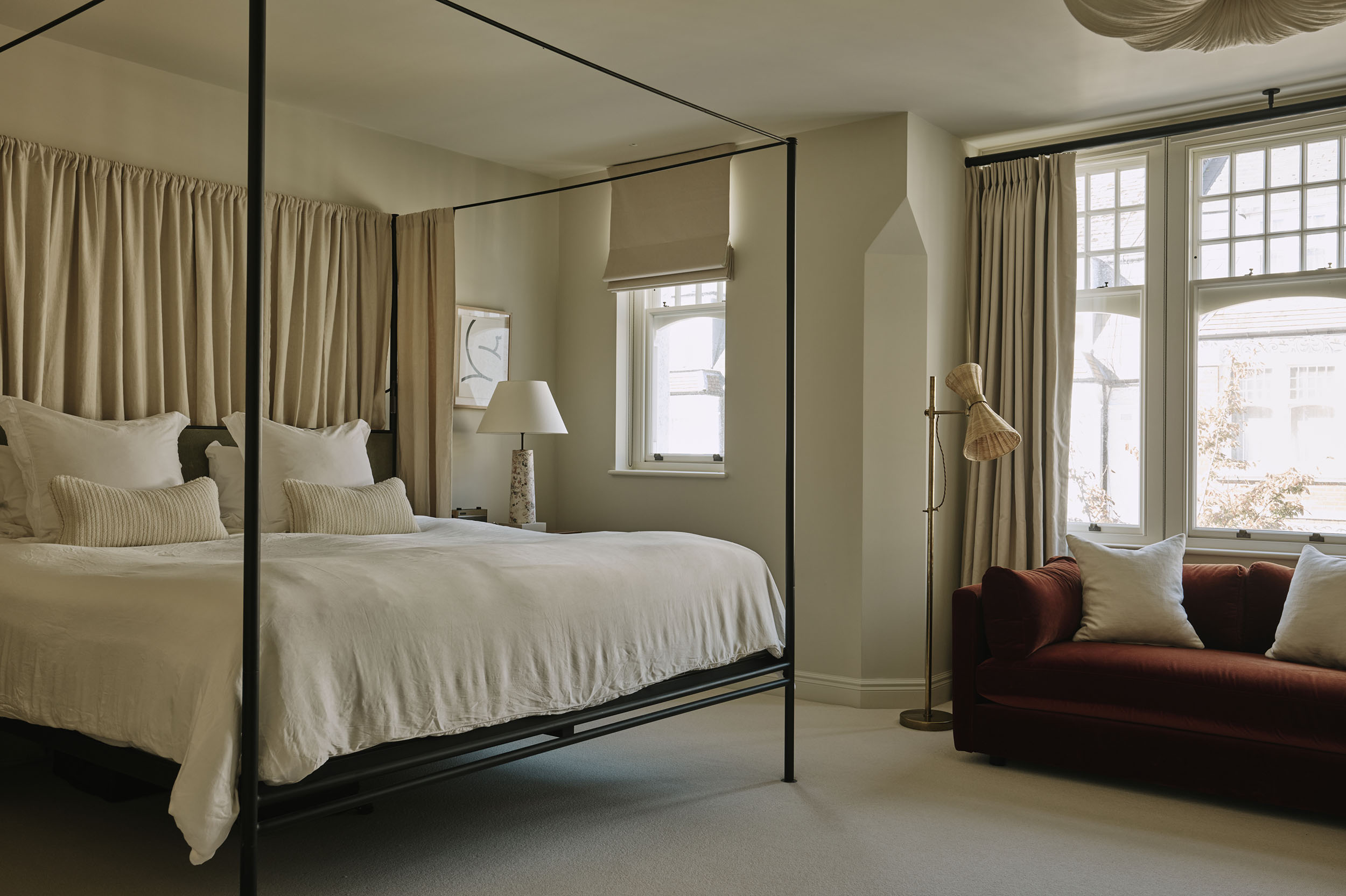 Master bedroom with four poster bed, interior design by Studio Squire